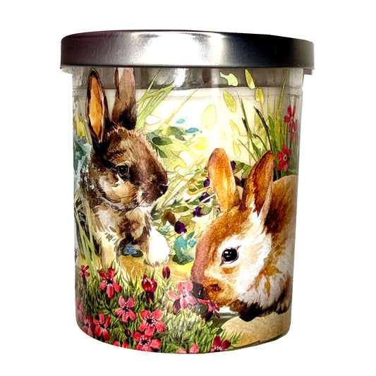 Candle jar with rabbit design on a white background