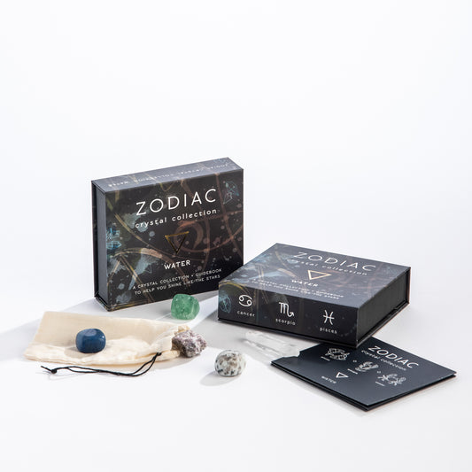 Zodiac crystal collection water packaging with crystals and cards on a white background