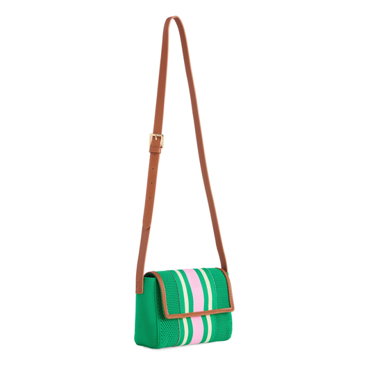 Green and pink striped handbag with a brown strap on a white background