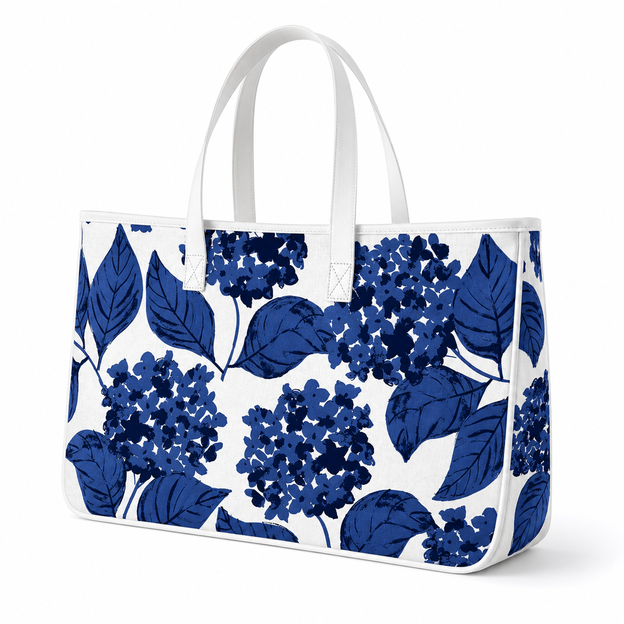 Blue hydrangea canvas tote bag with white handles,