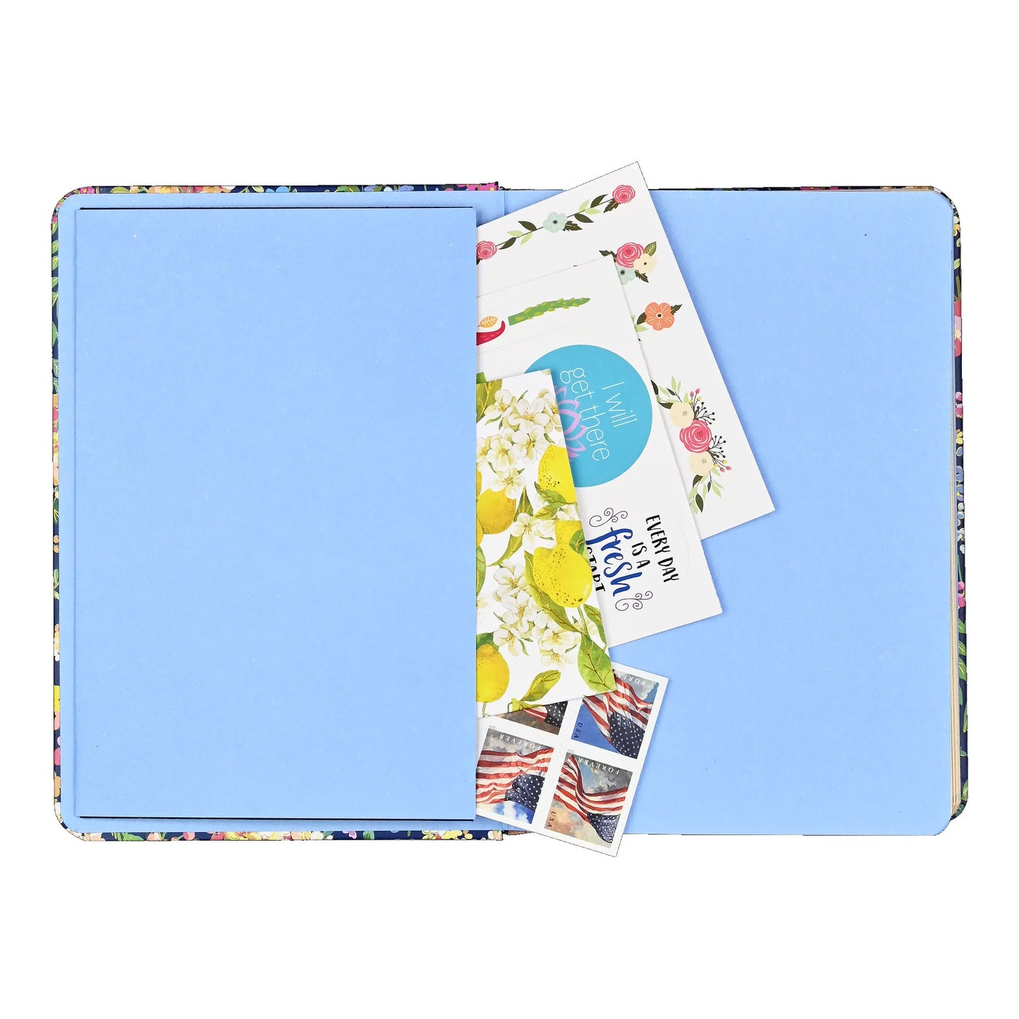 Back-Flap of a Floral-patterned notebook with postcards and stamps on a white background