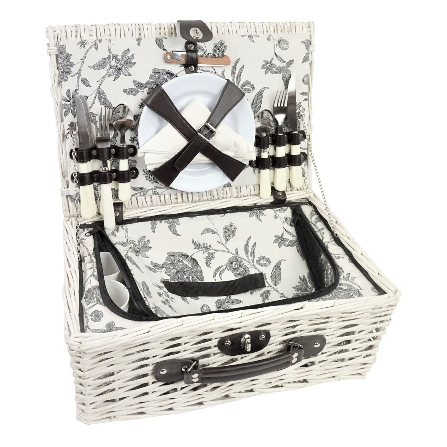 White wicker picnic basket with floral pattern, cutlery, and plates on a white background
