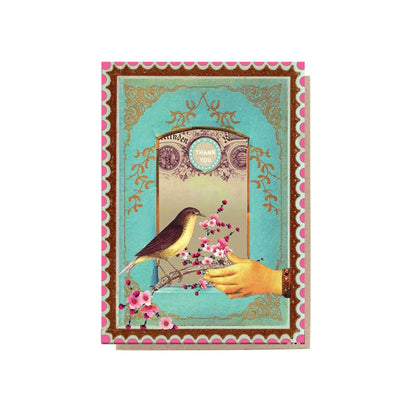 Greeting card with a hand holding flowers and a bird on a decorative background