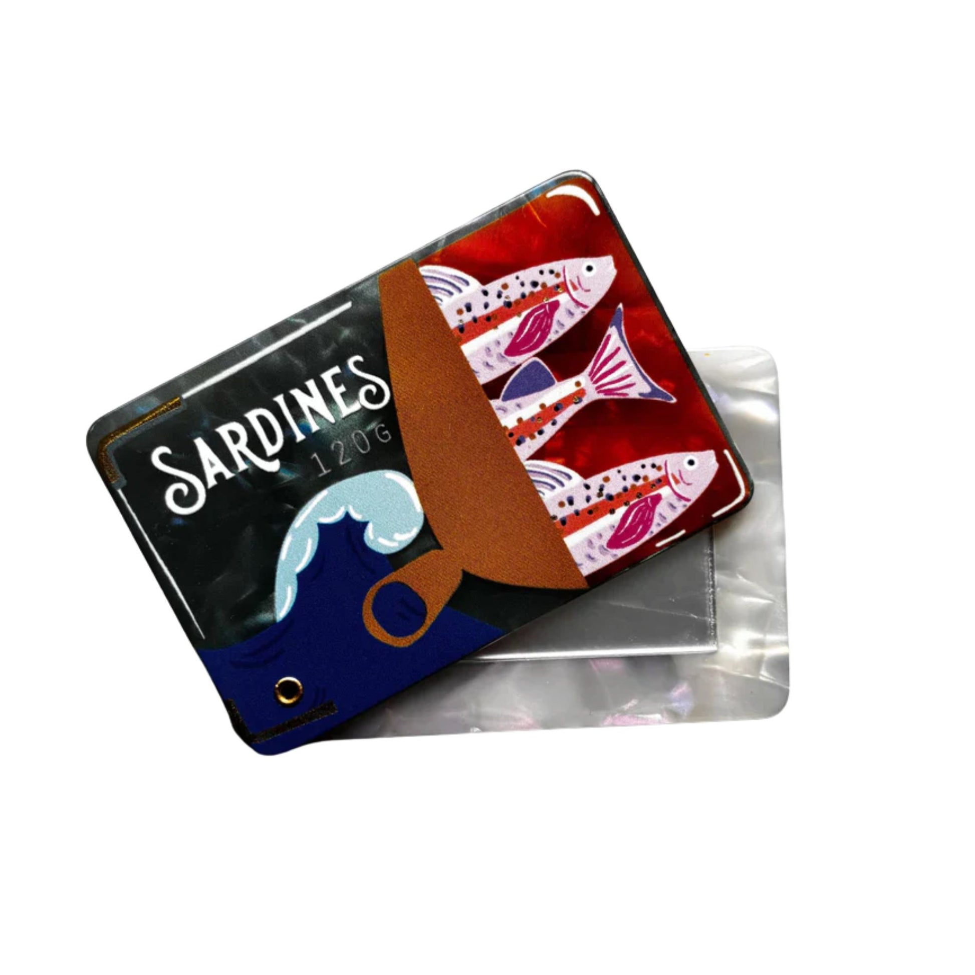 Sardine can-shaped product with colorful design on a white background