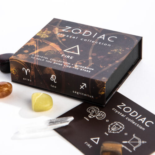 Zodiac crystal collection box with crystals on a white background