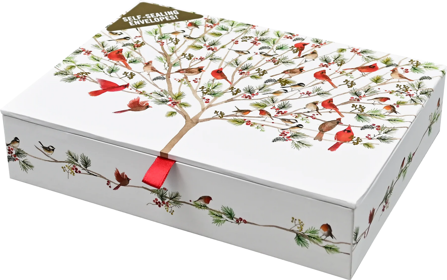 A white rectangular gift box with a lid printed with a winter tree of life design featuring red cardinals, green pine branches, and small birds. A red ribbon tie is visible at the center front, and a small tag at the top reads 'SELF-ADHESIVE ENVELOPE!'.