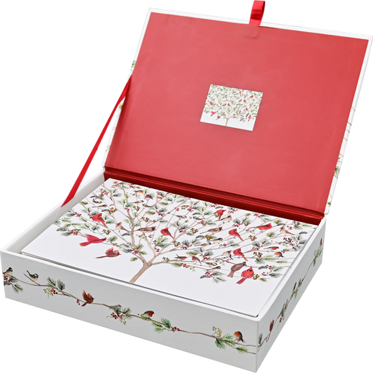 An open gift box with a red interior lid and a white exterior decorated with a bird tree illustration. The box is shown on a clean white background, with a red ribbon handle visible at the top.