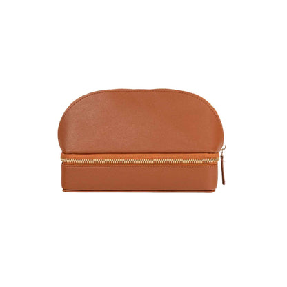 A stylish men's travel case featuring multiple compartments, a secure zip closure, and ample space for grooming essentials, chargers, and travel accessories. 