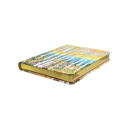 Floral patterned notebook on a white background