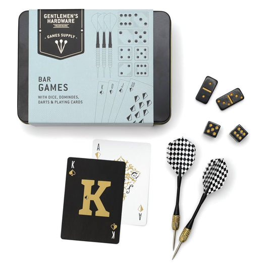 A bar games set from Gentlemen's Hardware, including a tin box, playing cards, dominoes, and two checkered darts, arranged on a white background.