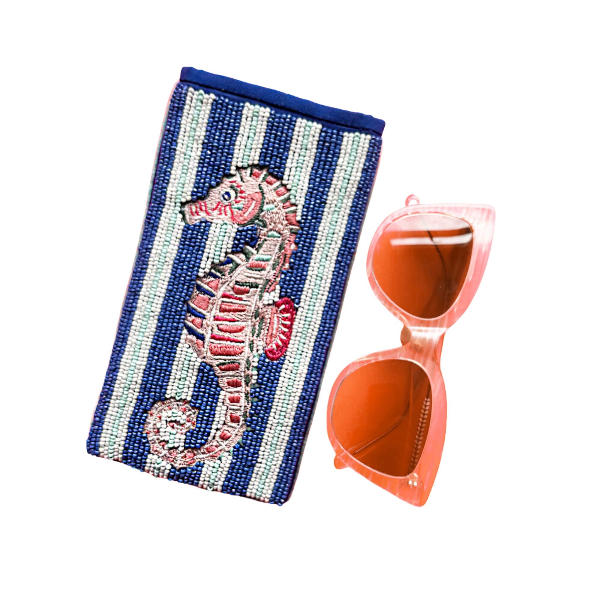 Beaded pouch with seahorse design and pink sunglasses on a white background