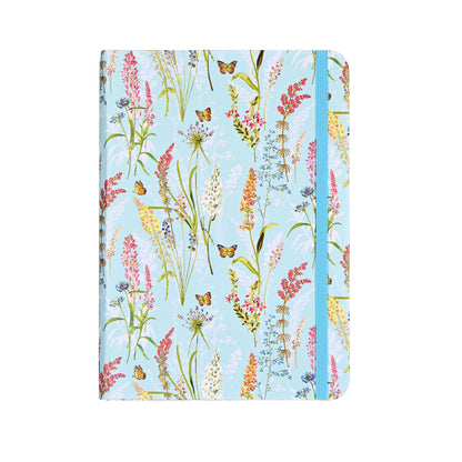 Notebook with floral design on a light blue background