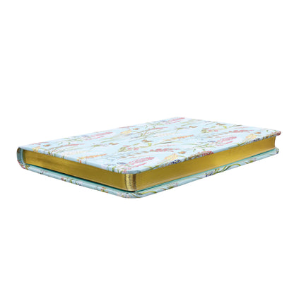 Decorative notebook with floral pattern on a white background