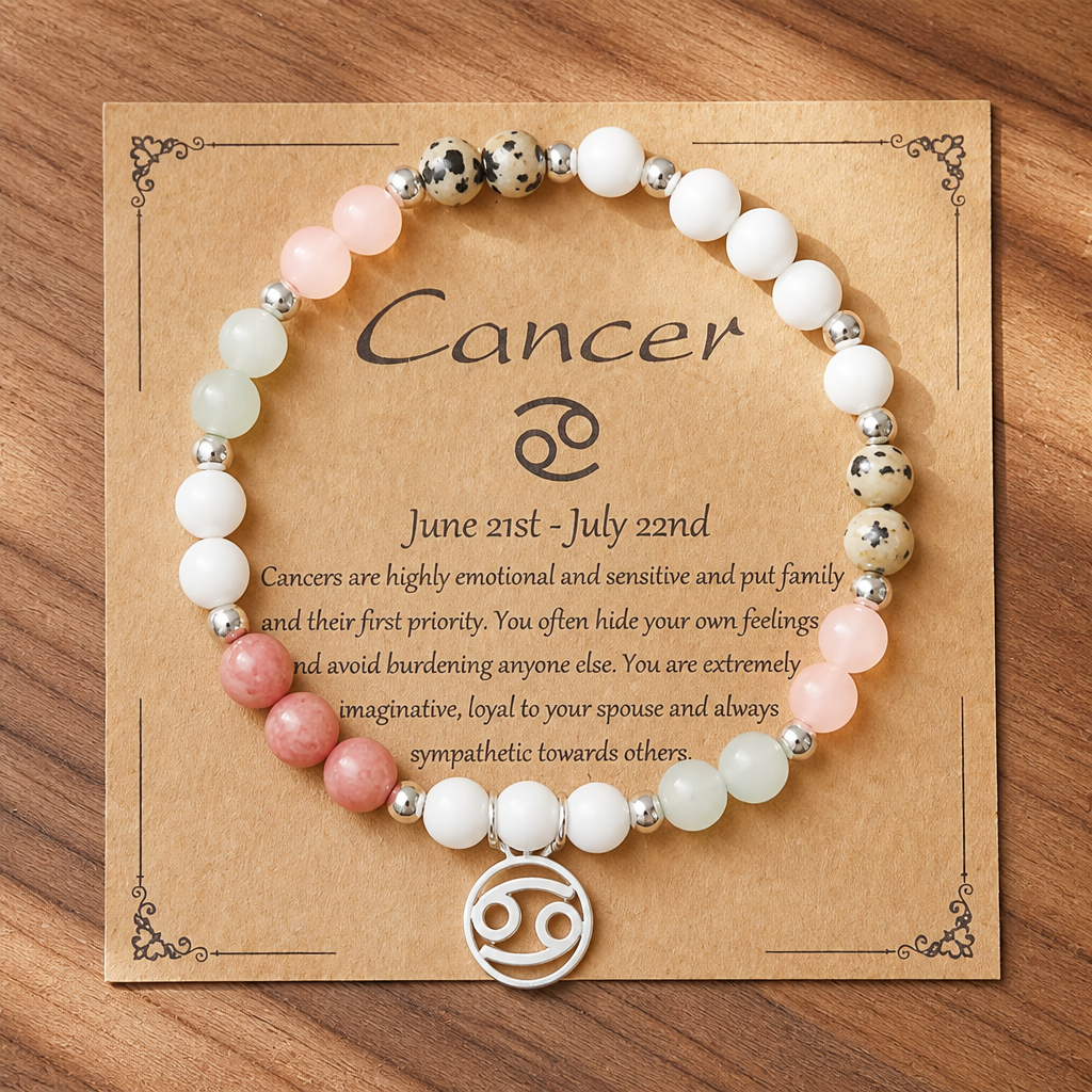 Bracelet with Cancer zodiac symbol on a wooden background