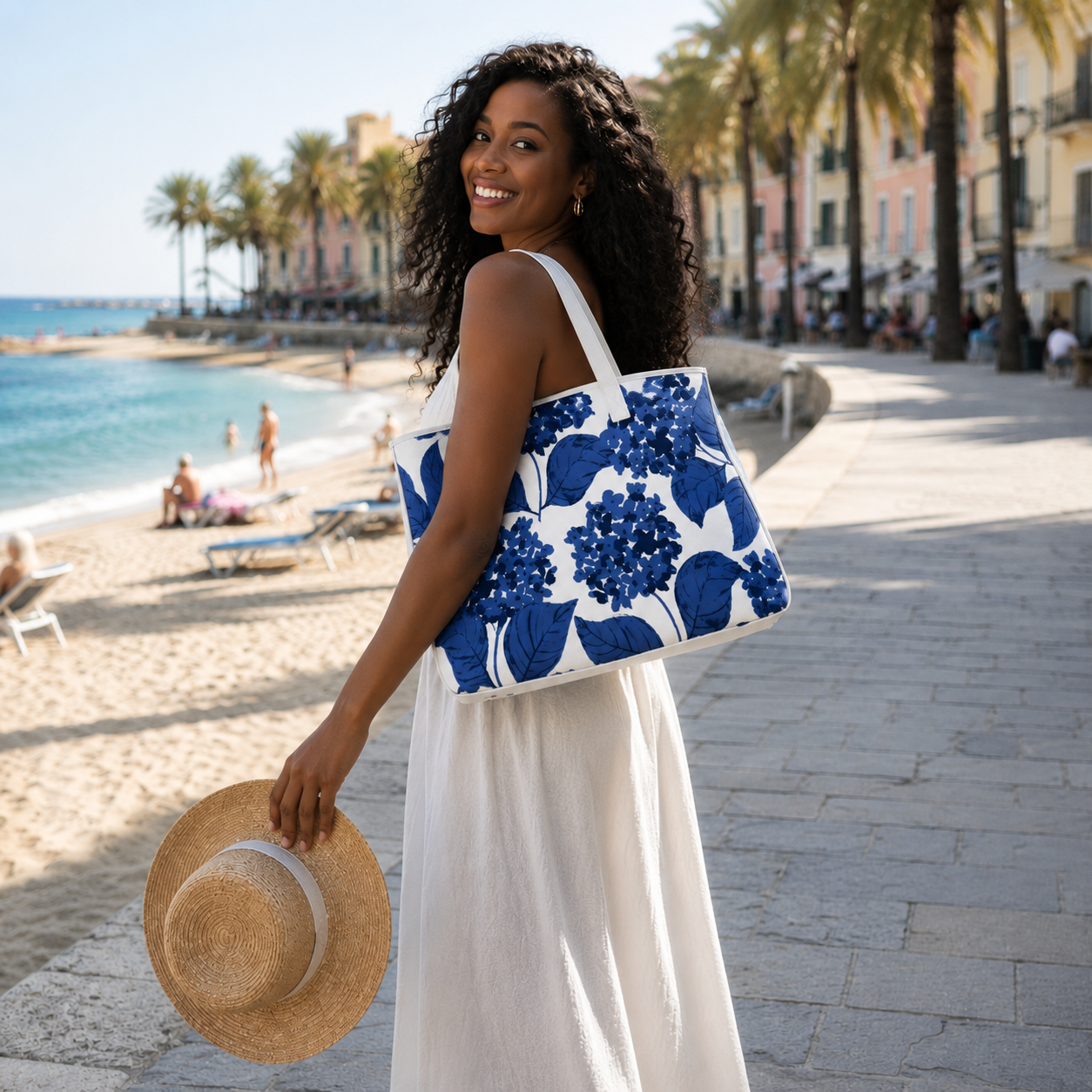 Floral canvas tote bag with white handles, spacious botanical carryall for shopping, beach trips, travel, market visits, and everyday errands.
