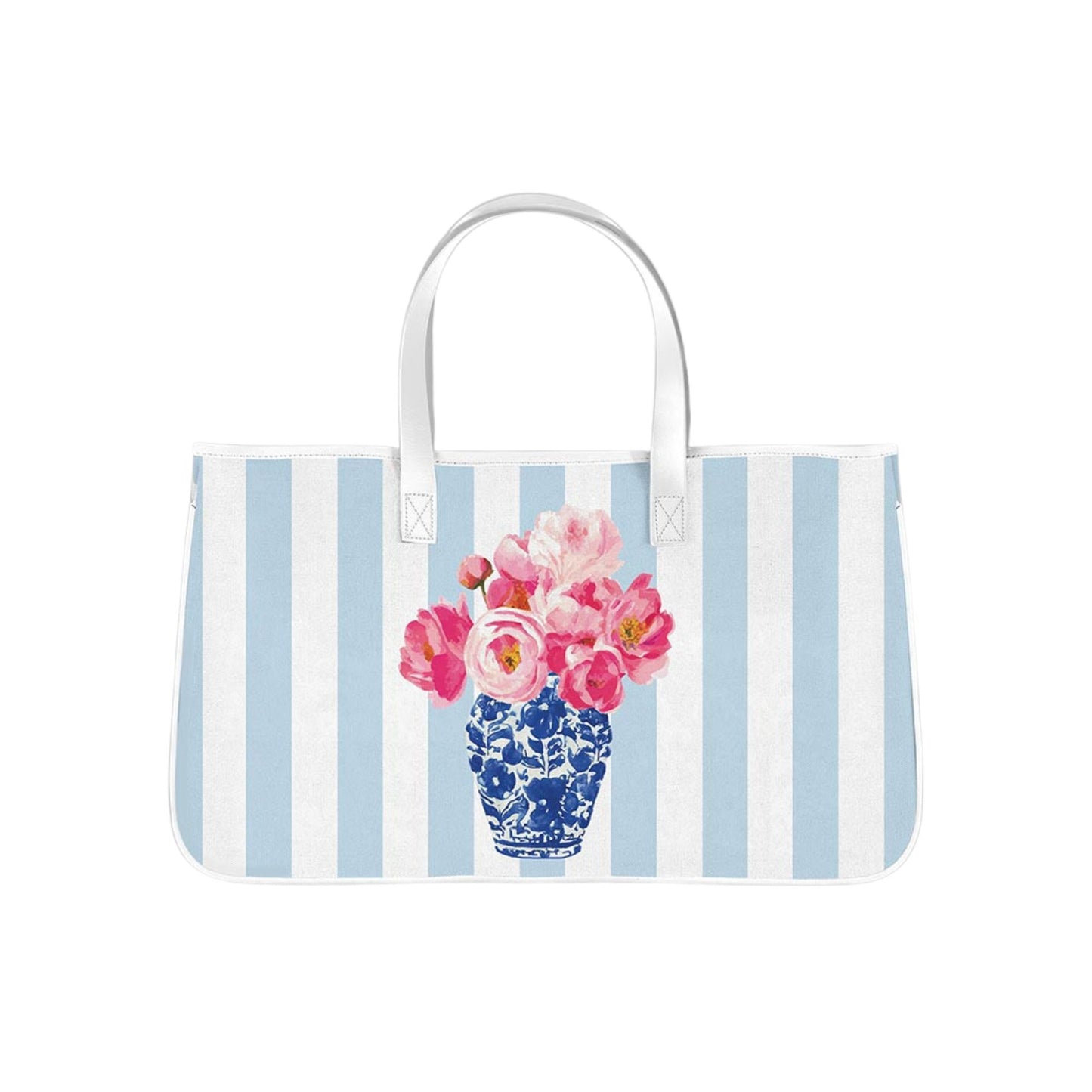 This spacious canvas tote features soft blue-and-white stripes paired with a vibrant floral arrangement in a classic blue porcelain vase.