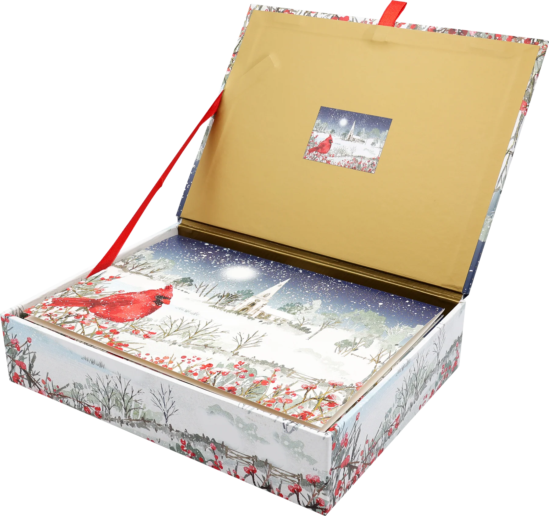 Card box with a cardinal perches on snow- and berry-laden branches, with a country church in the distance. 