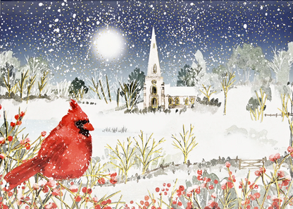 Card box with a cardinal perches on snow- and berry-laden branches, with a country church in the distance. 