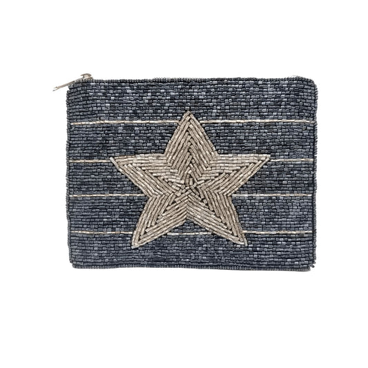 A small zippered pouch or coin purse with a dark navy blue beaded background, featuring a large beige star motif in the center and thin horizontal beige stripes.