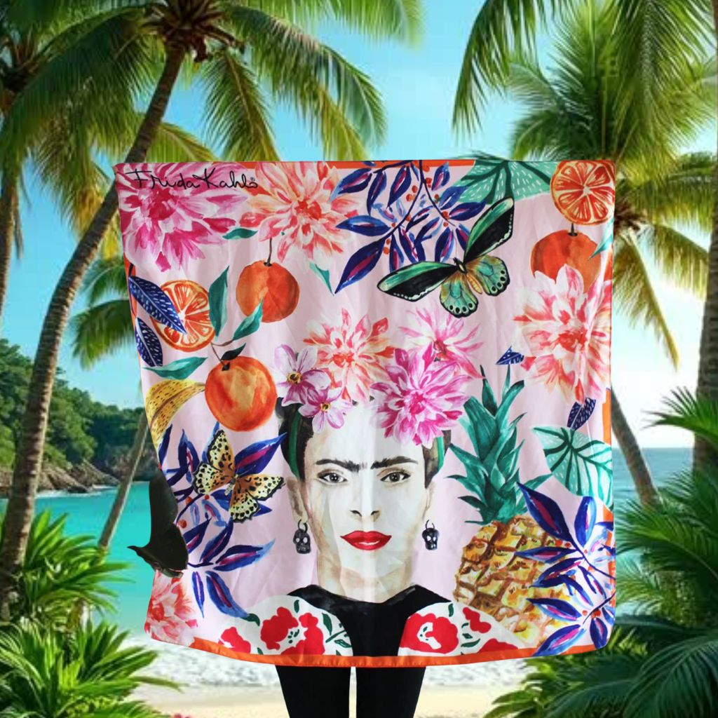 Frida Kahlo-themed silk scarf with tropical design in a beach setting