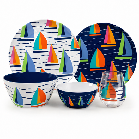 A 5-piece nautical-themed dinnerware set featuring a sailboat pattern, including two plates, two bowls, and a stemless wine glass, displayed on a clean white background.