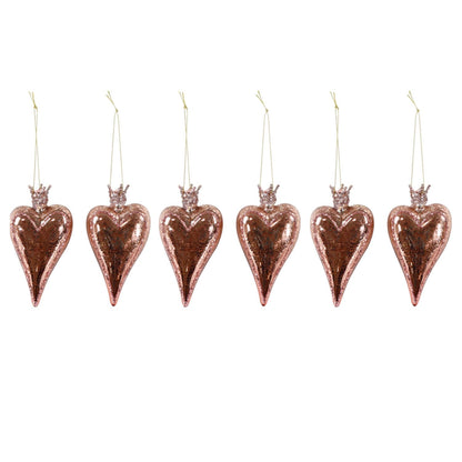 Set of six rose gold heart-shaped ornaments on a white background