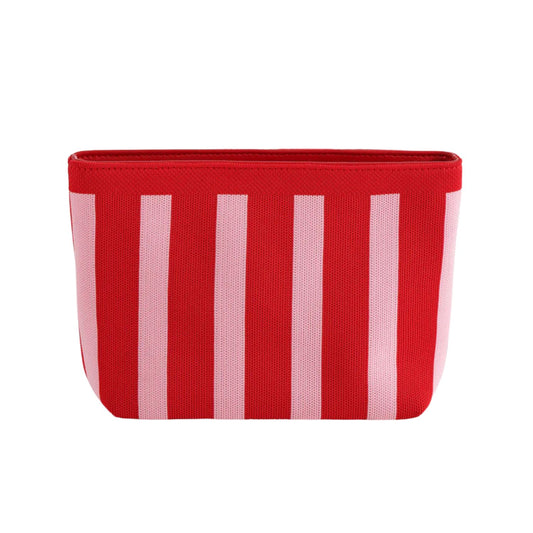 Red and pink striped container on a white background