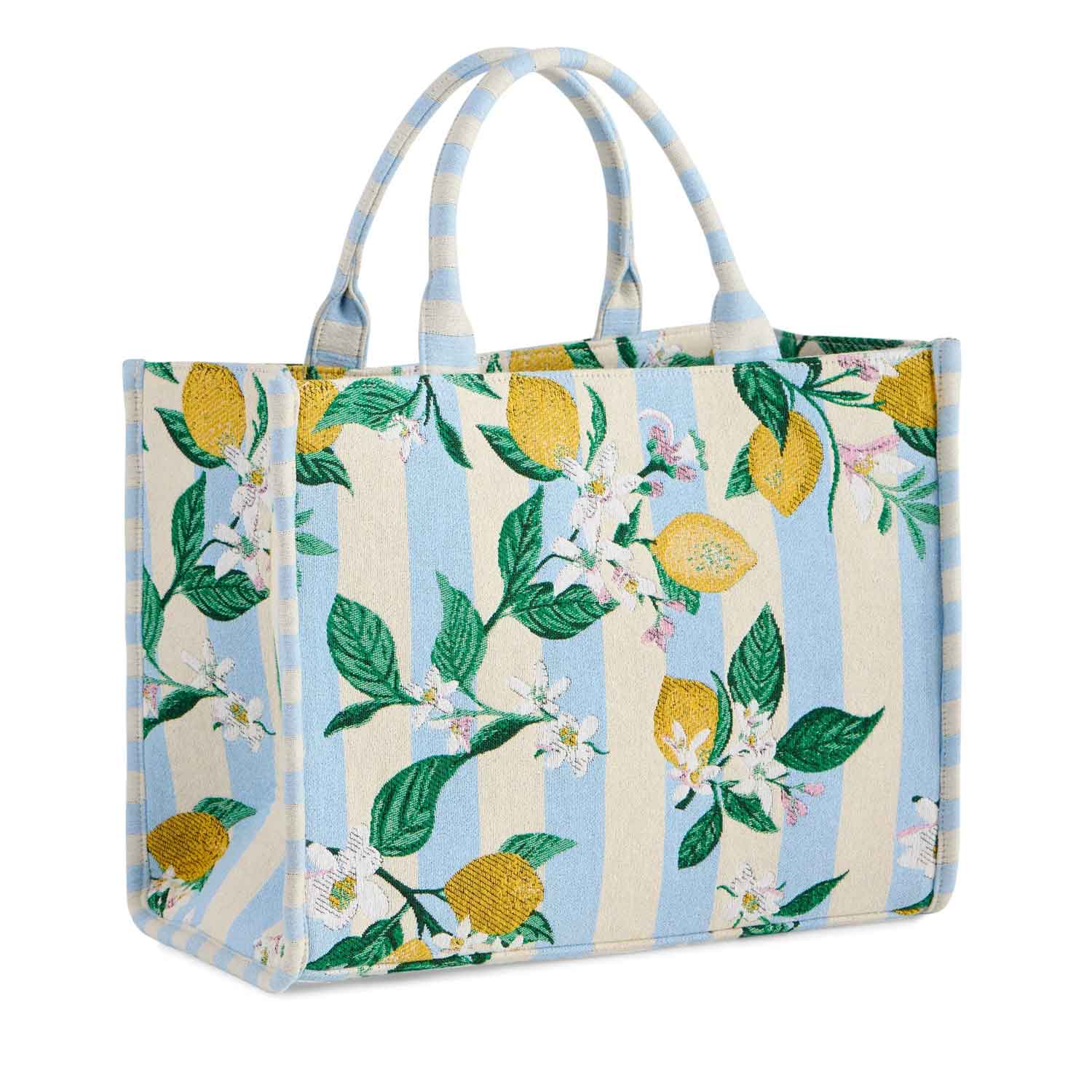 Tote bag with lemon and floral pattern on a white background