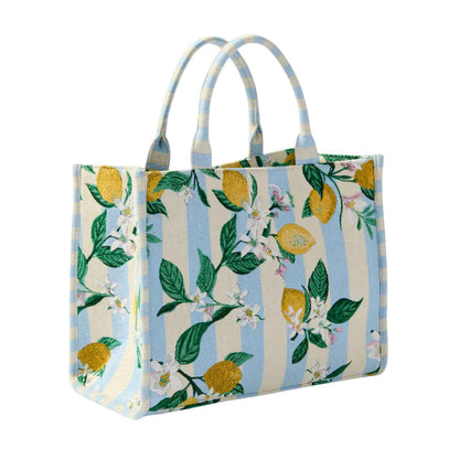 Tote bag with lemon and floral pattern on a white background