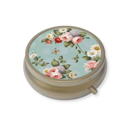 Closed round light blue floral pillbox with vintage botanical pattern