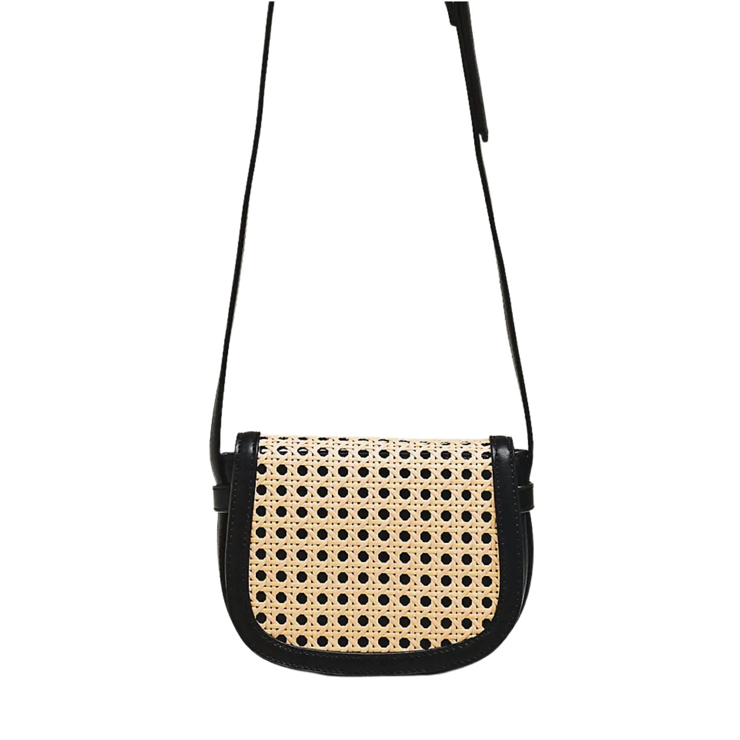 A small shoulder bag with a black leather trim and strap, featuring a natural woven cane or rattan front panel with a black circular dot pattern, shown against a plain white background.
