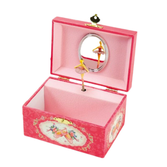 Pink jewelry music box with ballerina design on a white background
