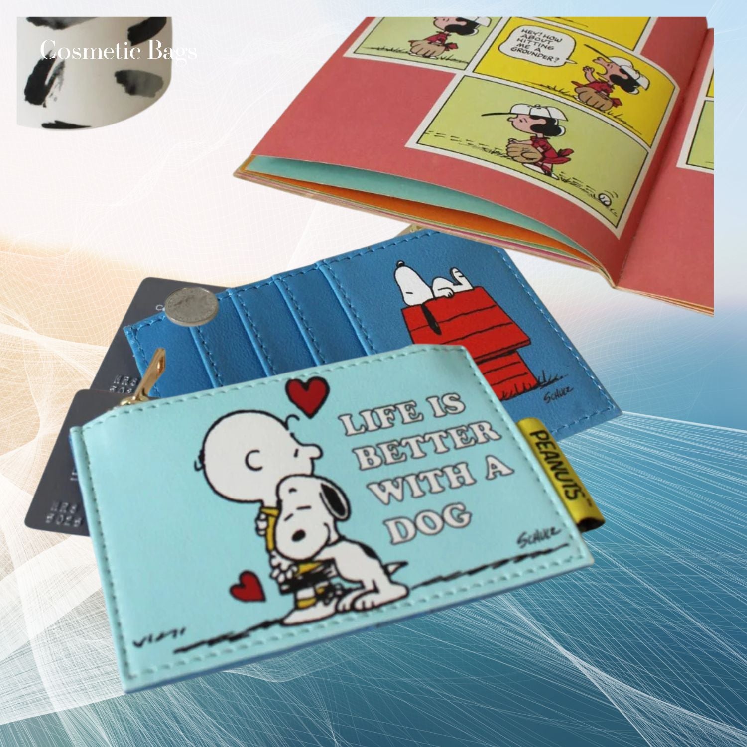 A Peanuts-themed wallet featuring Snoopy and Woodstock with the text 'LIFE IS BETTER WITH A DOG' on the front, displayed alongside other items including a comic book and a small circular inset.