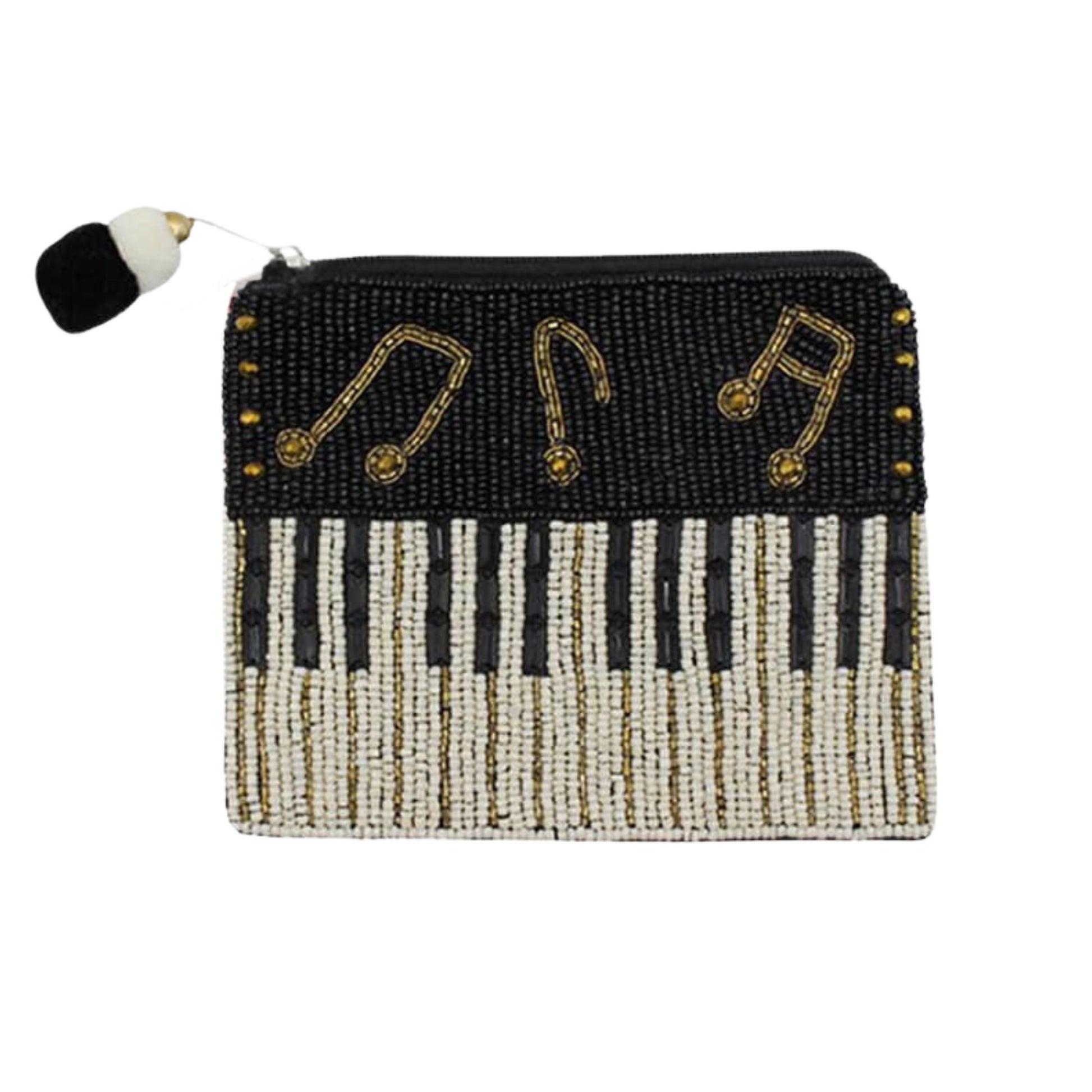 Hand-beaded piano keyboard coin purse with musical notes.