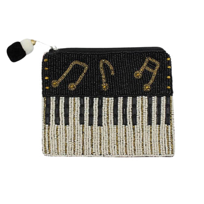 Hand-beaded piano keyboard coin purse with musical notes.