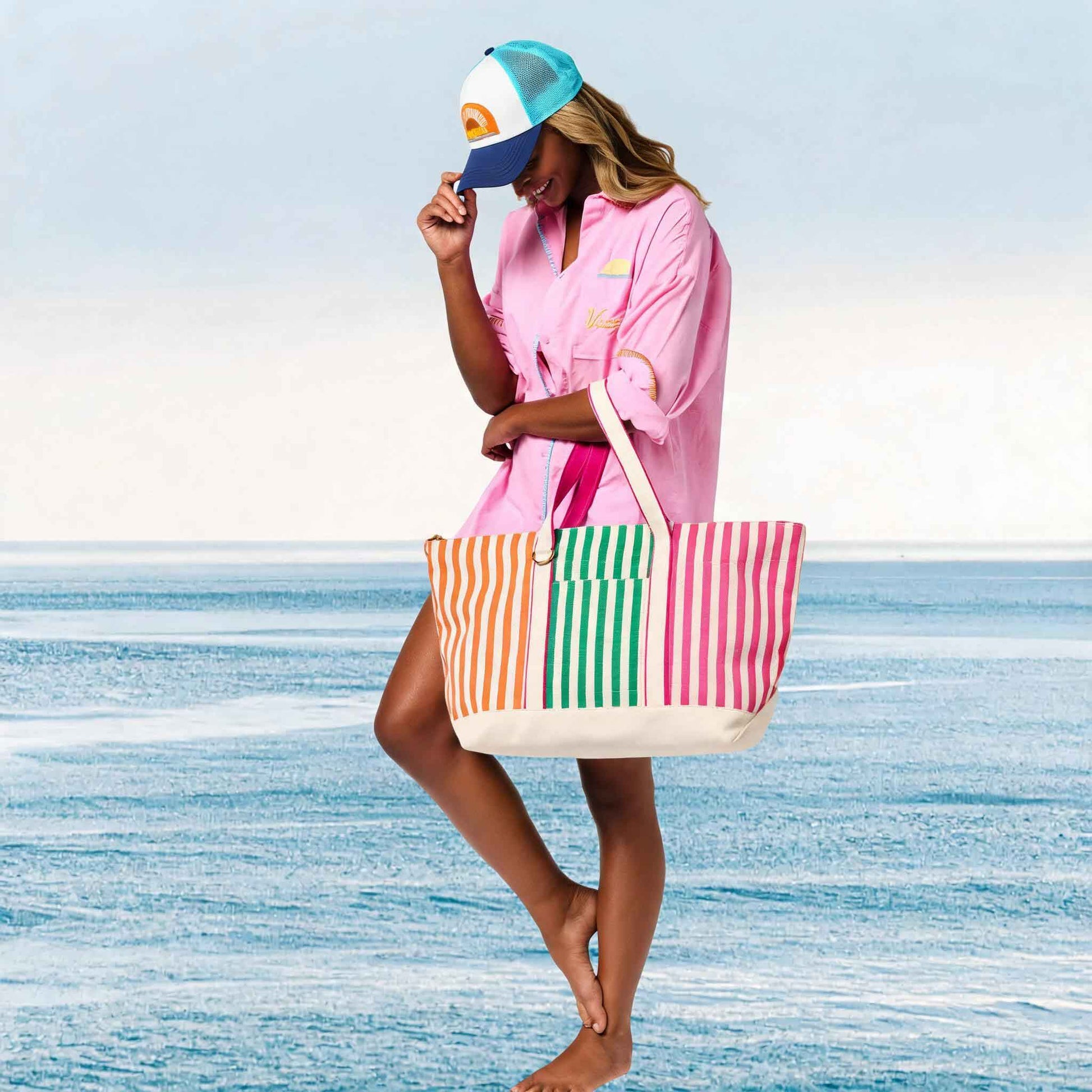 Name
Alt text


Suggestion

Woman on a beach holding a colorful striped tote bag