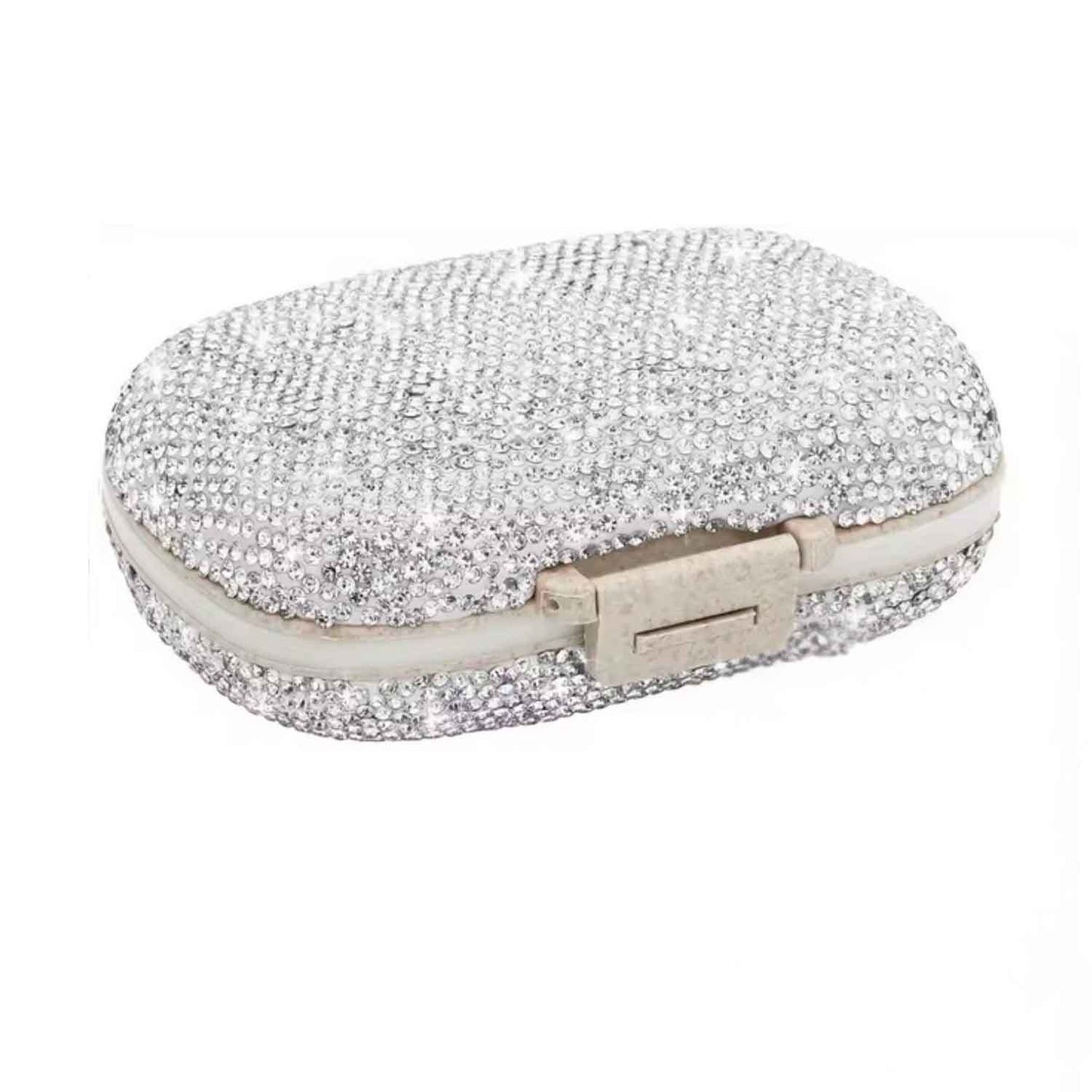 Closed silver bling pillbox with sparkling crystal exterior