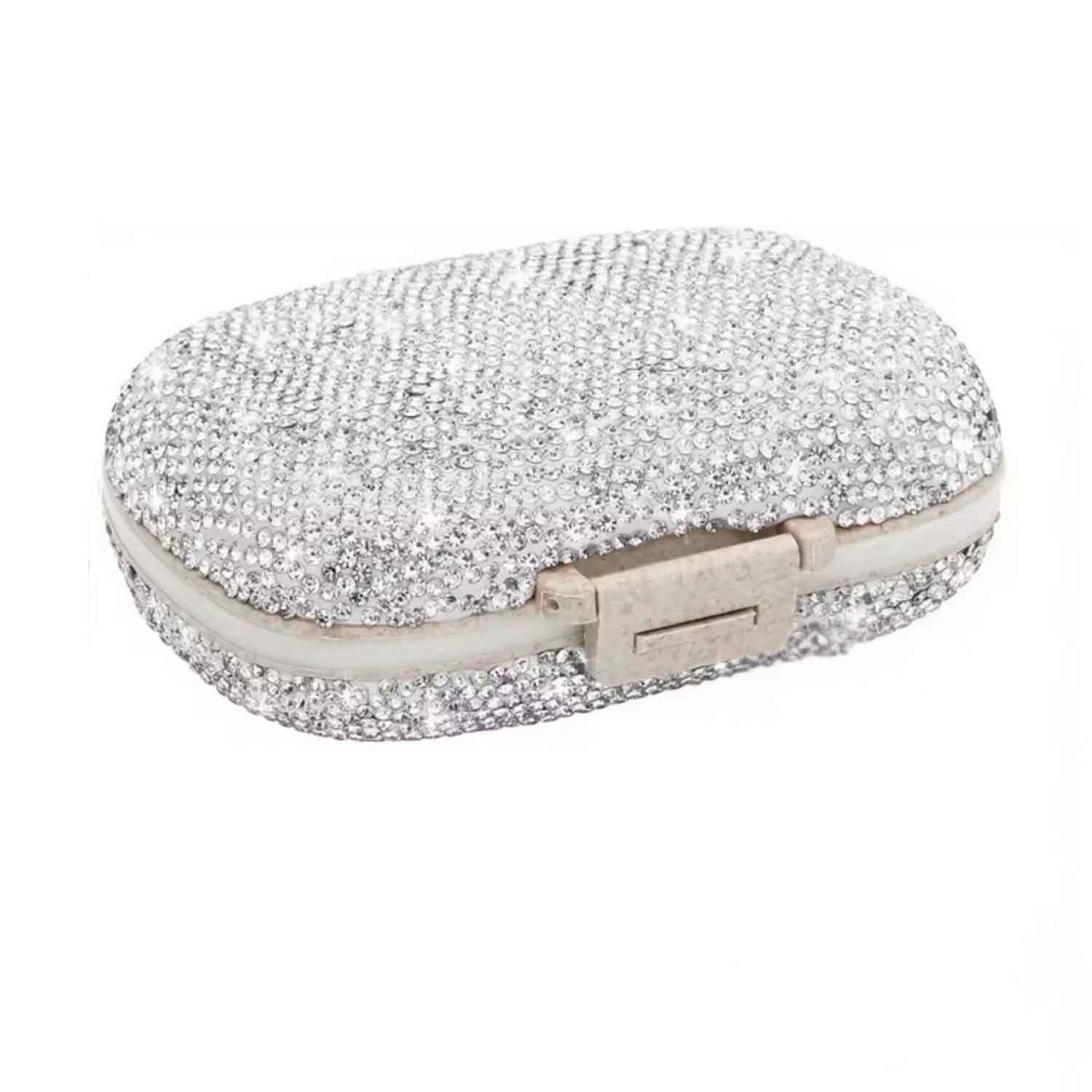 Closed silver bling pillbox with sparkling crystal exterior