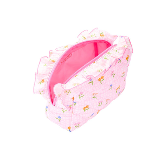 A light pink quilted fabric organizer bag with a small floral print, featuring a ruffled top trim, pink ribbon bow, and drawstring closure, shown on a plain white background.