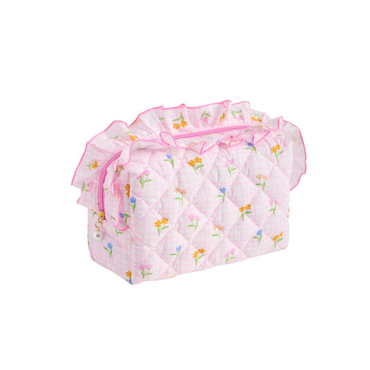 A light pink quilted fabric organizer bag with a small floral print, featuring a ruffled top trim, pink ribbon bow, and drawstring closure, shown on a plain white background.