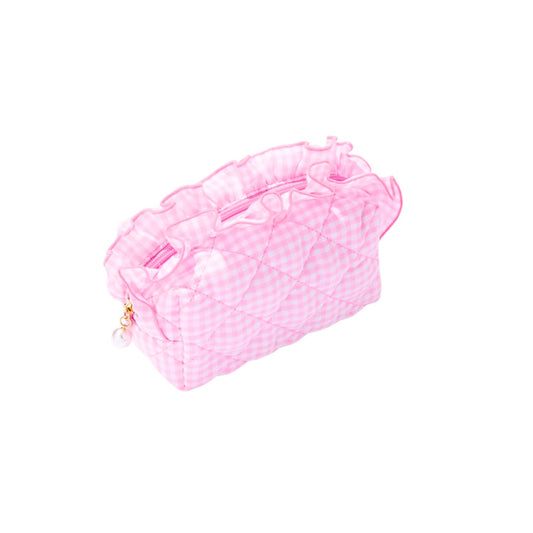 A pink and white gingham quilted cosmetic bag with ruffled trim and a small gold charm, shown on a plain white background.