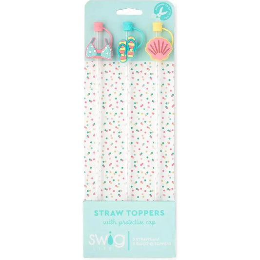 Packaged straw toppers with decorative elements on a white background