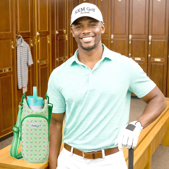 Man in golf attire with a green bag and water bottle in a locker room setting